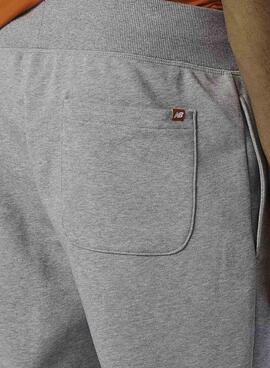 Pantalón New Balance Essential Stacked Gris Hombre
