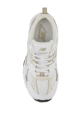 Zapatillas New Balance blancas 530 blancas y doradas para niños