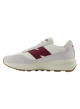 Zapatillas New Balance U370 blanco y granate para mujer y hombre