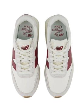 Zapatillas New Balance U370 blanco y granate para mujer y hombre