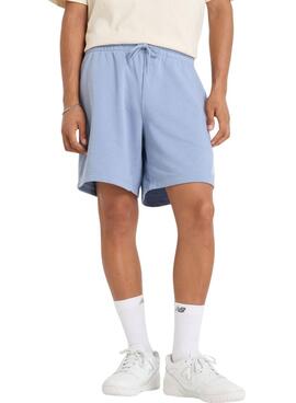 Bermuda New Balance Sport Essentials azul para hombre