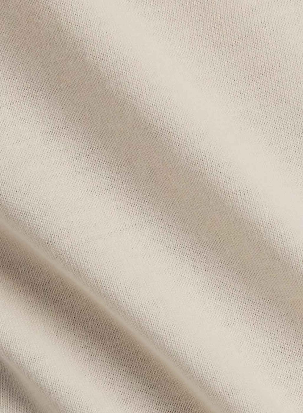 Camiseta New Balance Reimagined beige para mujer