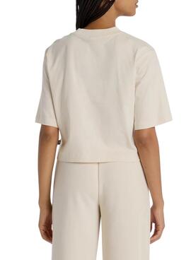 Camiseta New Balance Reimagined beige para mujer