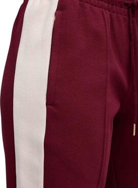 Pantalón Puma deportivo acampanado granate  T7 para mujer
