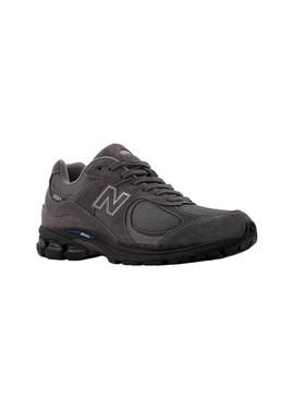 Zapatillas New Balance U2002R morado y negro para hombre
