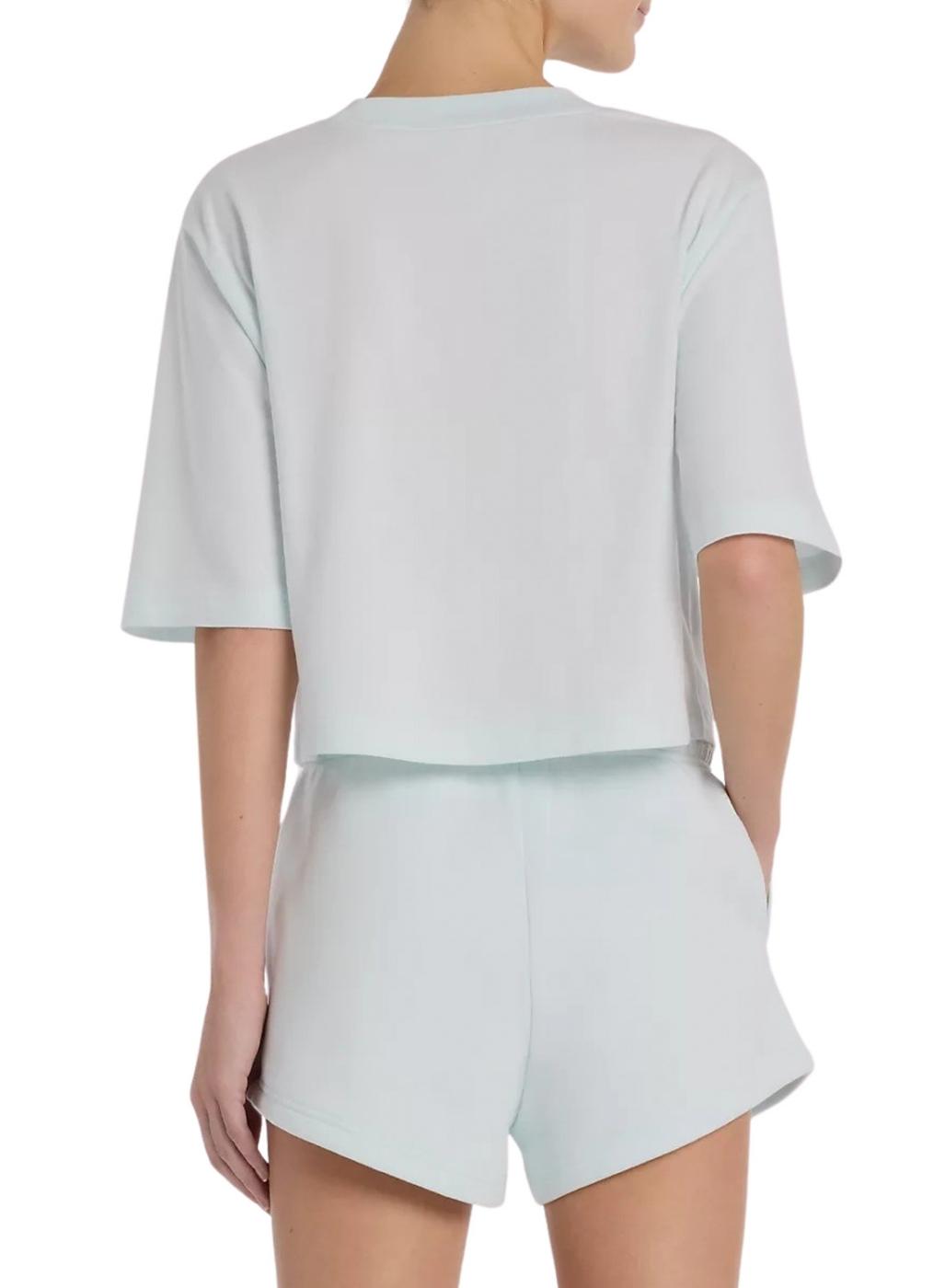 Camiseta New Balance oversize turquesa para mujer